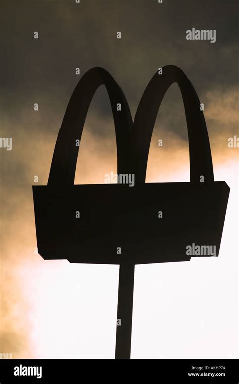 McDonald's golden arches in silhouette Stock Photo - Alamy