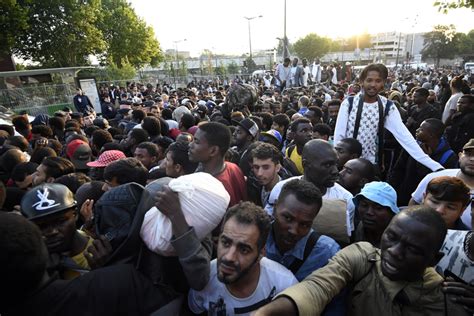 Paris clears out thousands of people from makeshift migrant camp ...