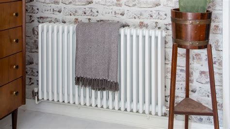 How to flush a radiator to improve your heating | Ideal Home