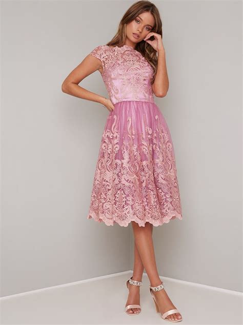 Find perfection in pink with this pretty Rose Lace Dress.This beauty is ...