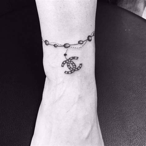 Chanel Tattoo | Tattoo Ideas and Inspiration | Tattoos, Chanel tattoo ...