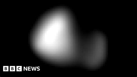 Pluto's moon Kerberos finally shows itself - BBC News