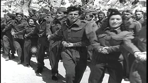 The Yugoslav Partisans dance and sing in Yugoslavia during World War II ...