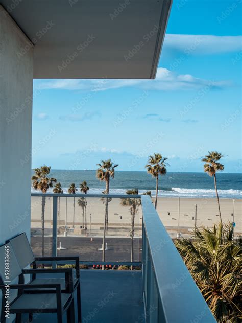 Iconic Palm Trees and Beach in Blue Sky from the Balcony at Luxury ...