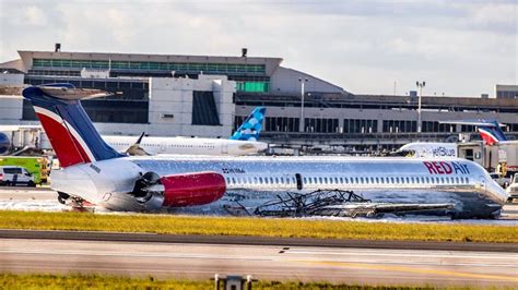 Plane crash-lands at Miami Airport and bursts into flames after landing ...