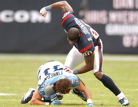 Texans WR Andre Johnson pummels Titans DB Cortland... - SI Photo Blog