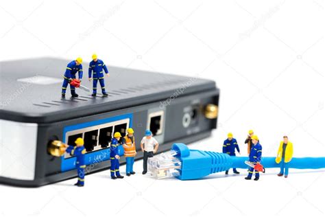 Technicians connecting network cable. Network connection concept ...