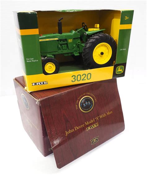 At Auction: (2) Ertl John Deere tractors