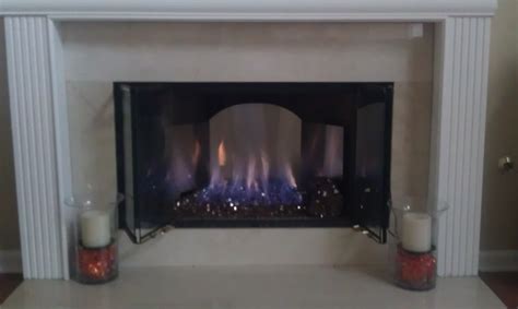 New gas fireplace with copper glass pieces | Gas fireplace, Fireplace ...