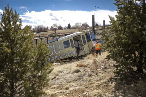 Two injured after RTD train derails near Jefferson County Courthouse in ...