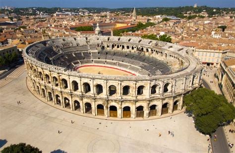 10 Famous Roman Amphitheaters | Nimes france, Roman monument, Nimes