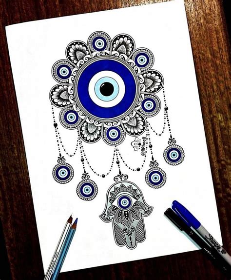 a drawing of an evil eye and hamsah with beads hanging from it's eyes