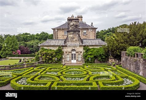 Pollok House in Pollok Country Park Glasgow Scotland with formal garden ...