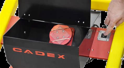 Cadex Inc - Sand abrader machine