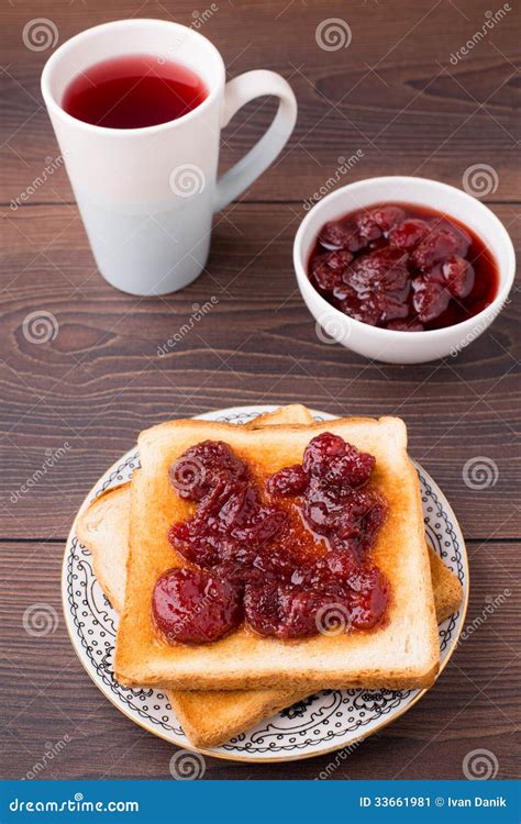 Toast with strawberry jam stock image. Image of meal - 33661981