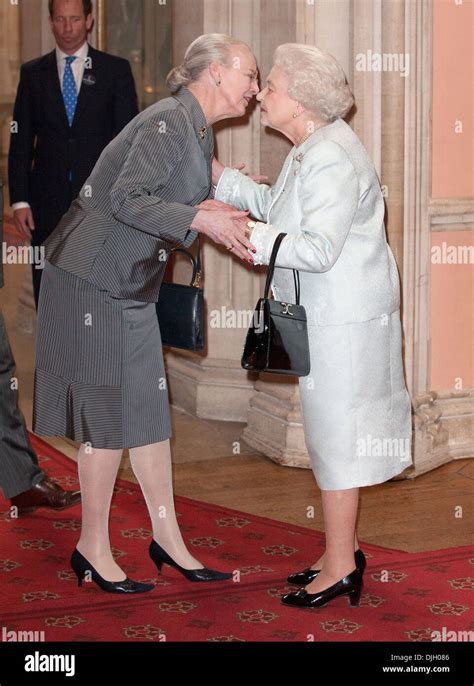 Queen Margrethe II of Denmark and Queen Elizabeth II Guests are greeted ...