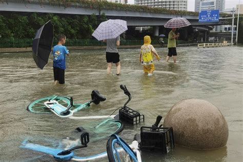 Thousands flee homes as heavy rain lashes China after Typhoon Doksuri