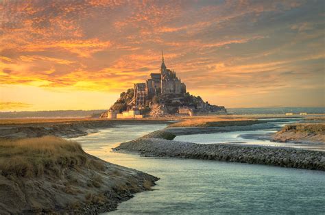 Sunset over Mont-Saint Michel | Perched on a rocky island in… | Flickr