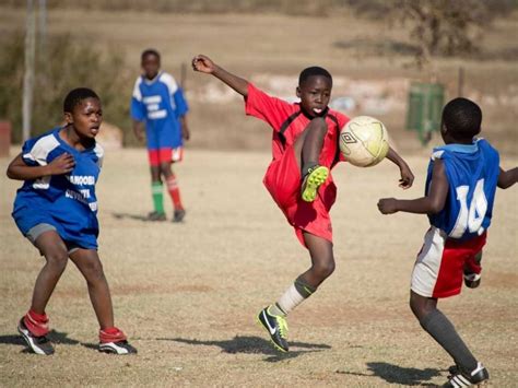 African Kids Playing Football