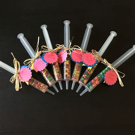 Gift for nurses week. 60cc syringe filled with candy. Tags made with my ...