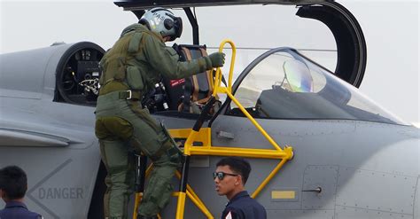 Soldier Entering Fighter Jet Cockpit · Free Stock Photo