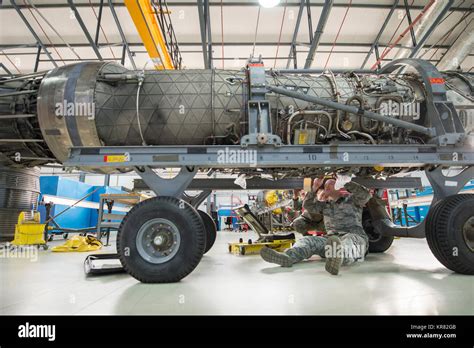 Airmen assigned to the 48th Component Maintenance Squadron inspect a ...