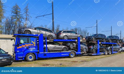 Car Carrier Trailer Transports Cars On Highway On Sunset Background ...