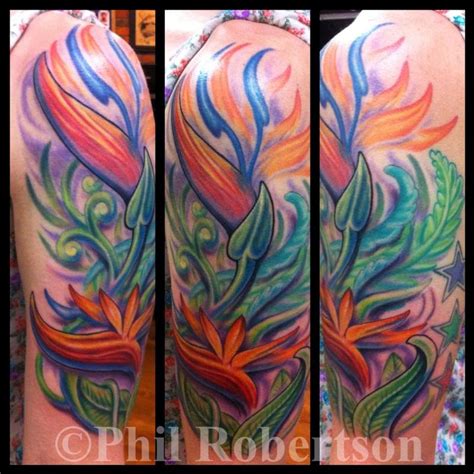 Bird of paradise flowers color tattoo by Phil Robertson: TattooNOW