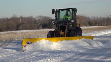 Arctic Sectional Plowing Snow 14LD mini-loader Pusher - YouTube