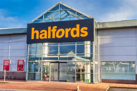 Halfords targets retirees in recruitment drive as profits drop amid ...