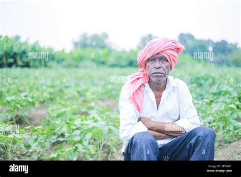 Indian poor farmer in farm, sad farmer, loss of farmer Stock Photo - Alamy