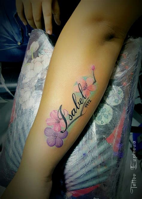 Tattoo flores nombre Isabel | Tattoos for daughters, Baby tattoos, Name ...