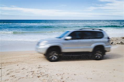 "Offroad Car On The Beach" by Stocksy Contributor "Mauro Grigollo ...