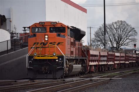 A BNSF SD70ACe sits on point of a BNSF unit rock train at Vancouver ...