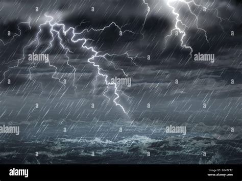 Extreme weather concept with dark storm clouds and stormy destructive ...