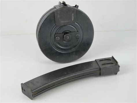 Sold at Auction: A PPSH-41 drum magazine together with a PPS-43 stick ...