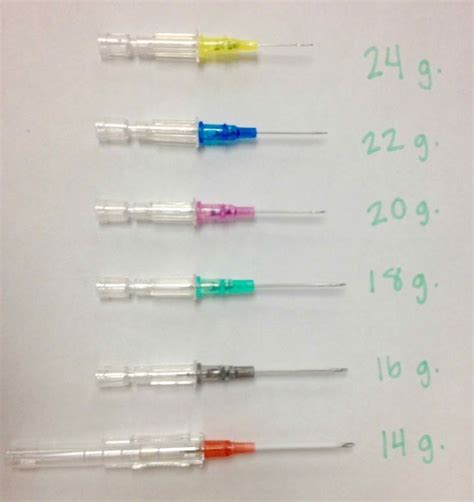 four sys are lined up next to each other on a sheet of white paper