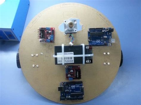 Differential drive configuration with two drive wheels and a castor ...