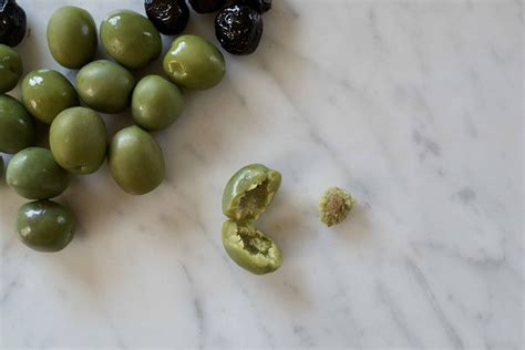 How to Pit Olives - Pit Black or Green Olives