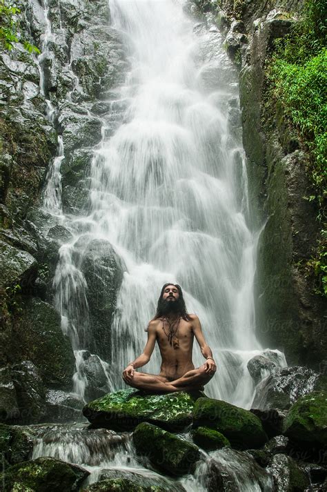 Yogi Meditating By The Waterfall by Lumina