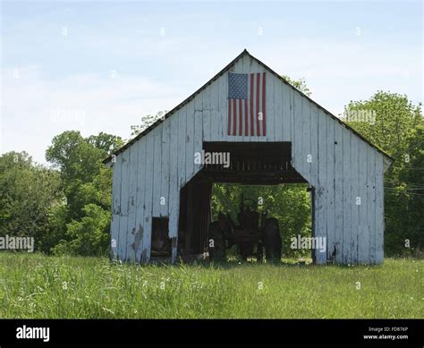 Tractor parked in barn hi-res stock photography and images - Alamy