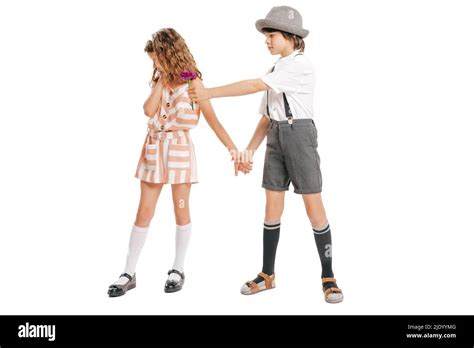 Portrait of little boy and girl, charming kids retro style outfit ...