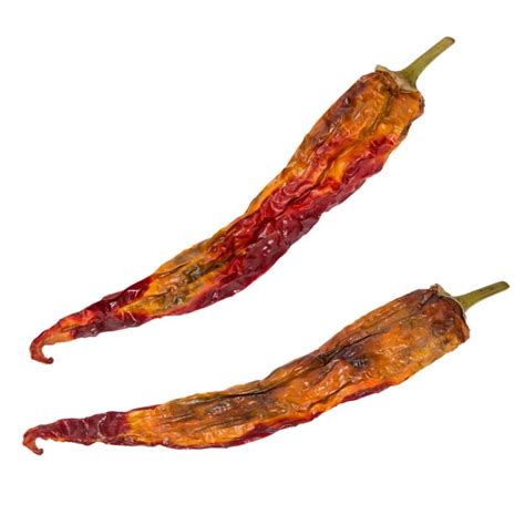 Premium Photo | Dry chili pepper isolated dried vegetable group of peppers