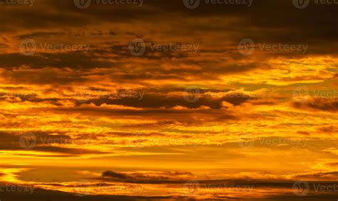 Beautiful sunset sky. Golden sunset sky with beautiful pattern of ...