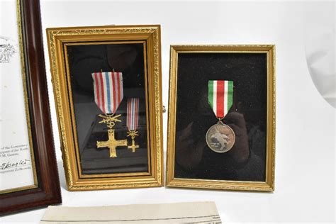 A Monte Cassino Gold Cross with Swords medal and miniature and further ...