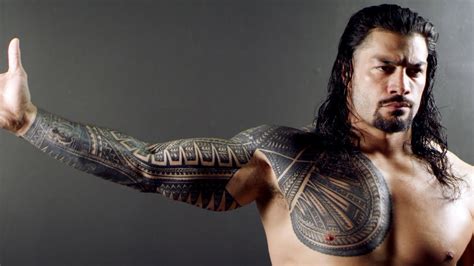 Roman Reigns reveals the importance of his tattoo - YouTube