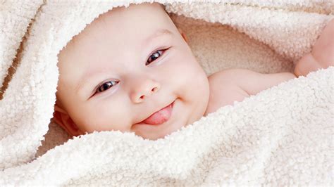 Cute Baby Covered With White Woolen Towel With Tongue Out Smiley HD ...