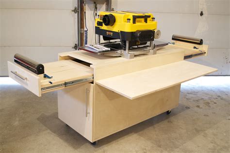 A custom planer bench I designed and built the out feed tables support ...