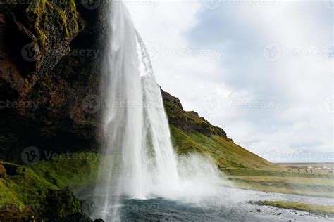 cave and Seljalandsfoss waterfall in Iceland 11443180 Stock Photo at ...