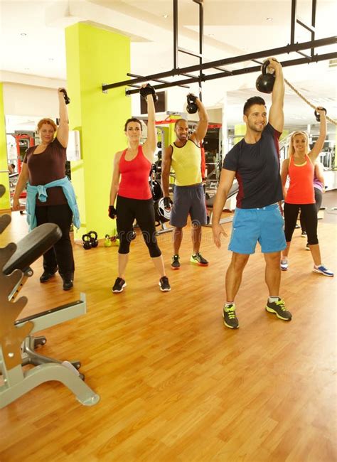 Group of People Doing Workout in Gym Stock Image - Image of dumbbells ...